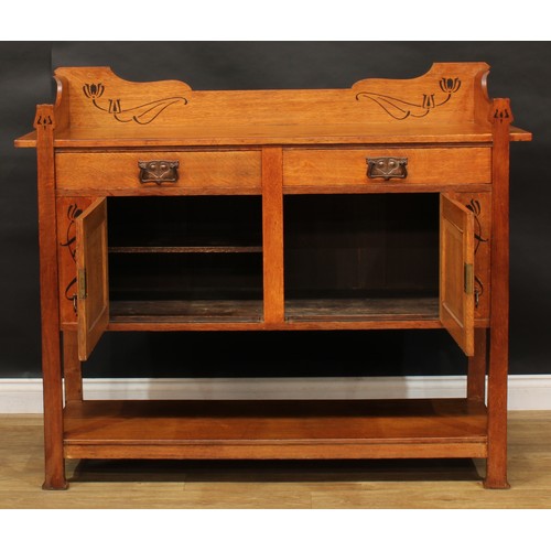 2326 - An Arts & Crafts oak and ebony marquetry buffet side cabinet, shaped three-quarter gallery above a p... 