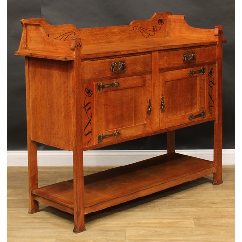 2326 - An Arts & Crafts oak and ebony marquetry buffet side cabinet, shaped three-quarter gallery above a p... 