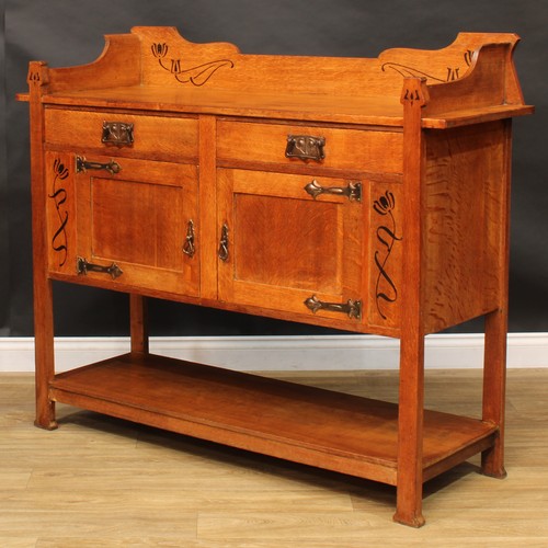 2326 - An Arts & Crafts oak and ebony marquetry buffet side cabinet, shaped three-quarter gallery above a p... 