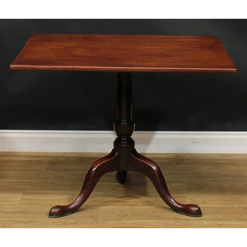 1743 - A George III mahogany tripod supper table, one-piece rectangular tilting top, turned column, cabriol... 