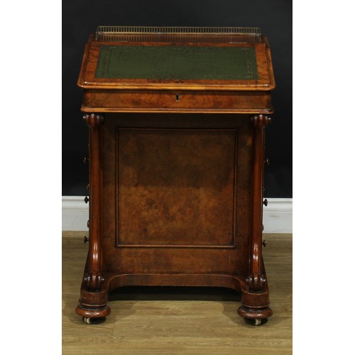 2288 - A Victorian walnut Davenport desk, brass three-quarter gallery, hinged sloping top with inset tooled... 