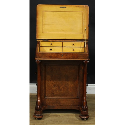 2288 - A Victorian walnut Davenport desk, brass three-quarter gallery, hinged sloping top with inset tooled... 