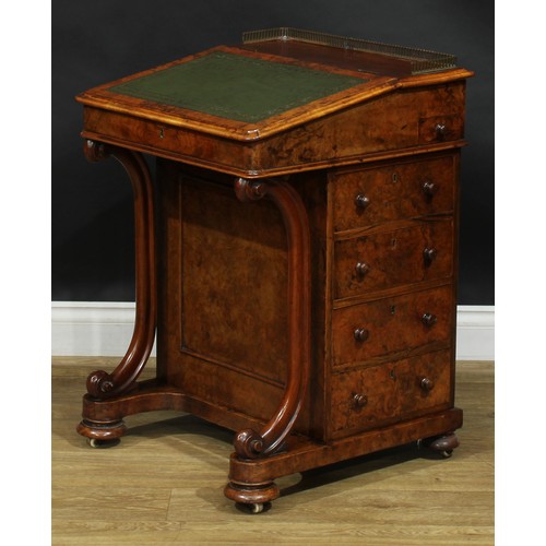 2288 - A Victorian walnut Davenport desk, brass three-quarter gallery, hinged sloping top with inset tooled... 