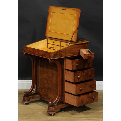 2288 - A Victorian walnut Davenport desk, brass three-quarter gallery, hinged sloping top with inset tooled... 