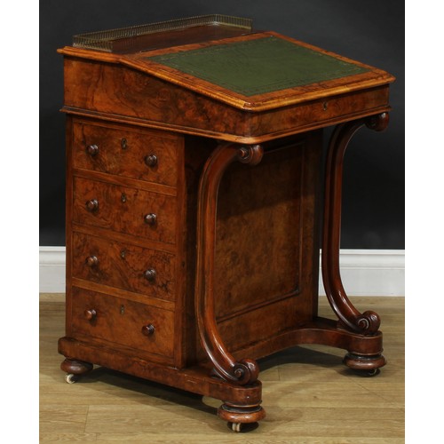 2288 - A Victorian walnut Davenport desk, brass three-quarter gallery, hinged sloping top with inset tooled... 