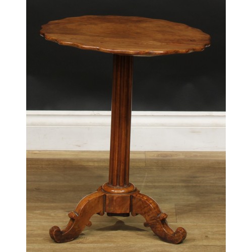 1640 - A 19th century walnut and satin birch tripod wine table, shaped circular top, fluted column, cabriol... 