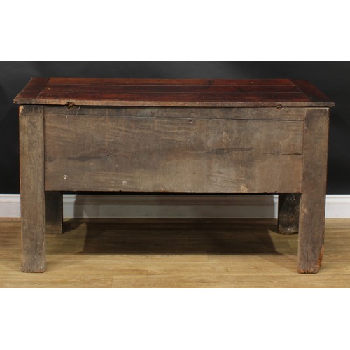 1995 - An 18th century fruitwood and oak dough bin or chest, plank top, shaped apron, stile feet, 74.5cm hi... 