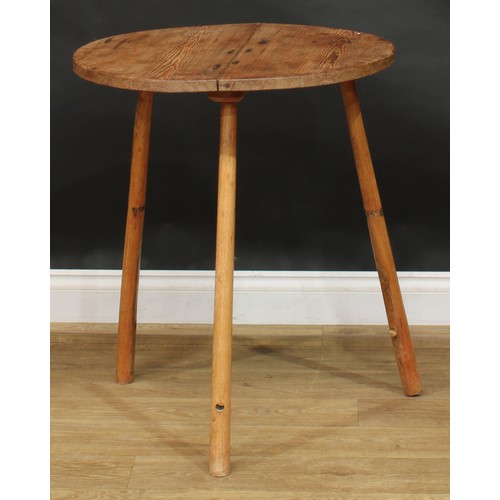 1717 - A 19th century pine and ash cricket table, circular top, 73cm high, 61cm diameter