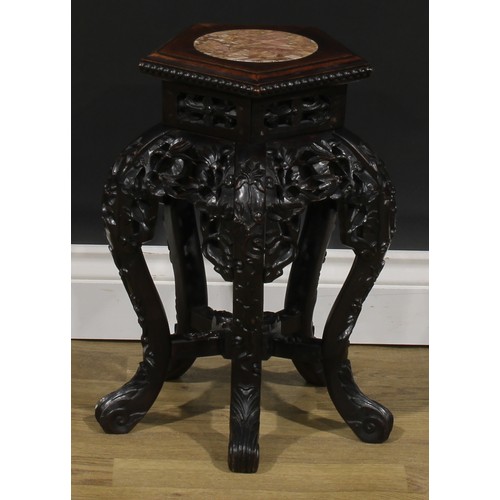 2025 - A Chinese hardwood jardiniere stand, pentagonal top with beaded border and inset marble panel, shape... 