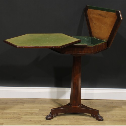 1630 - A 19th century mahogany hexagonal pedestal rent table, by Holland & Sons Ltd, badged, pivot-sliding ... 