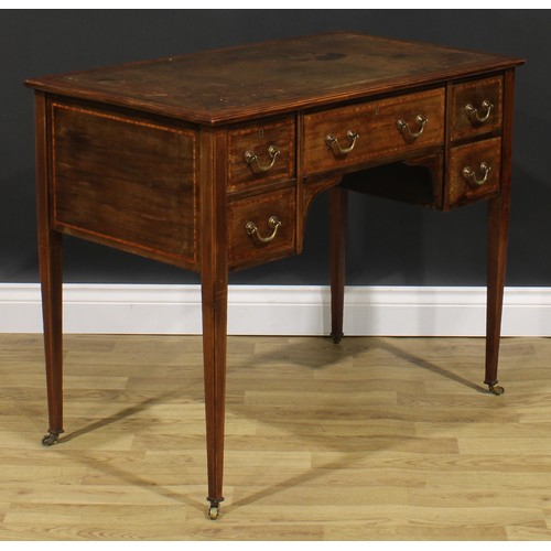 2394 - An Edwardian Sheraton Revival satinwood crossbanded mahogany desk, rectangular top with inset tooled... 