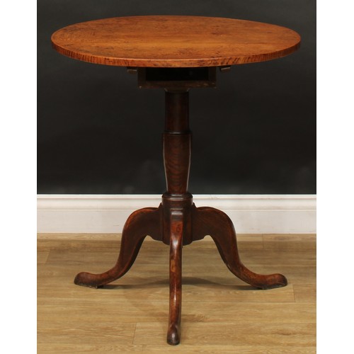 2044 - A George III vernacular oak tripod occasional table, possibly Welsh, circular tilting top, box-secti... 