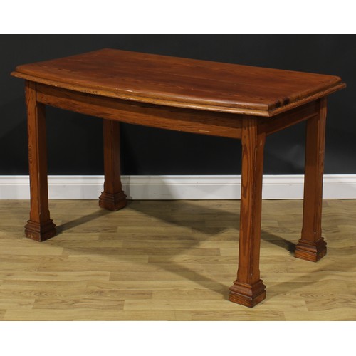 2661 - An Arts & Crafts pitch pine bowfront serving table, oversailing top, concave-chamfered square legs, ... 