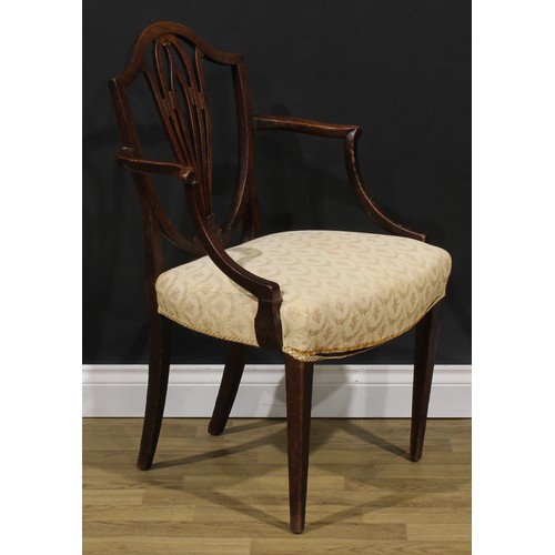 1798 - A George III mahogany Hepplewhite design elbow chair, 92.5cm high, 61cm wide, the seat 52.5cm wide a... 