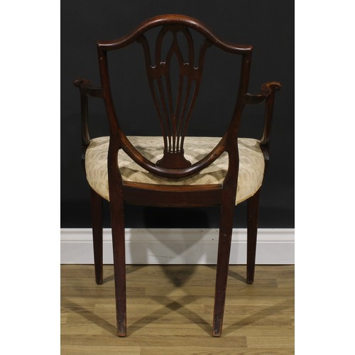 1798 - A George III mahogany Hepplewhite design elbow chair, 92.5cm high, 61cm wide, the seat 52.5cm wide a... 