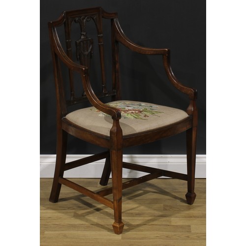 1798 - A George III mahogany Hepplewhite design elbow chair, 92.5cm high, 61cm wide, the seat 52.5cm wide a... 