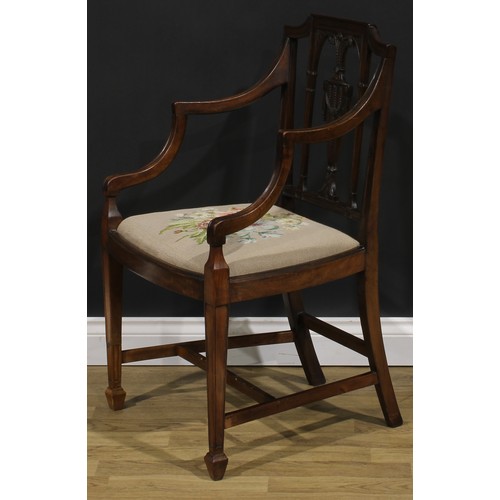 1798 - A George III mahogany Hepplewhite design elbow chair, 92.5cm high, 61cm wide, the seat 52.5cm wide a... 