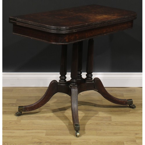 2048 - A George IV mahogany card table, in the manner of Gillows of Lancaster and London, hinged top with r... 