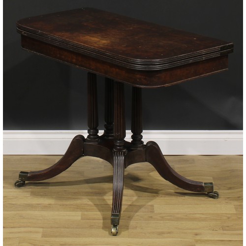 2048 - A George IV mahogany card table, in the manner of Gillows of Lancaster and London, hinged top with r... 