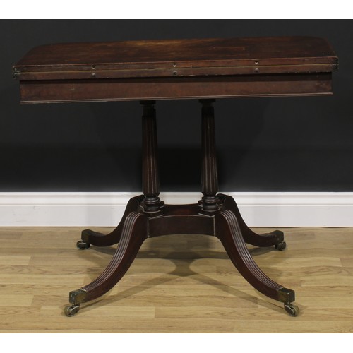 2048 - A George IV mahogany card table, in the manner of Gillows of Lancaster and London, hinged top with r... 