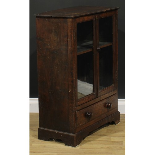 1712 - A 19th century oak study bookcase cabinet, of small proportions, rectangular top with moulded edge a... 