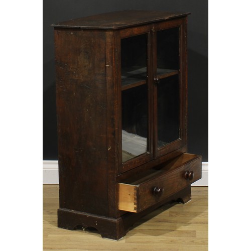 1712 - A 19th century oak study bookcase cabinet, of small proportions, rectangular top with moulded edge a... 