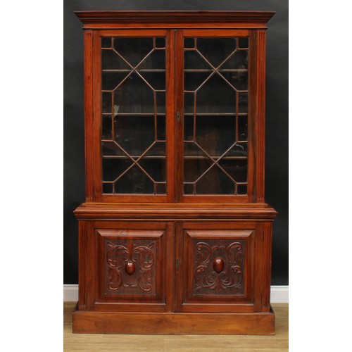 2290 - A Victorian walnut library bookcase, moulded cornice above a pair of astragal glazed doors enclosing... 