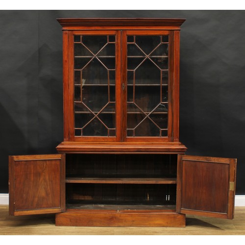 2290 - A Victorian walnut library bookcase, moulded cornice above a pair of astragal glazed doors enclosing... 