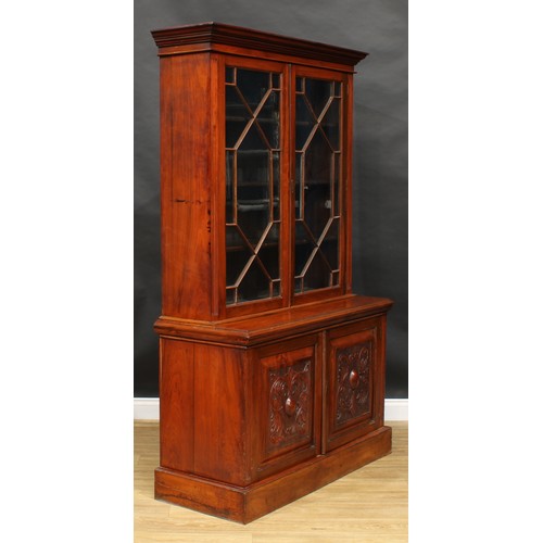 2290 - A Victorian walnut library bookcase, moulded cornice above a pair of astragal glazed doors enclosing... 