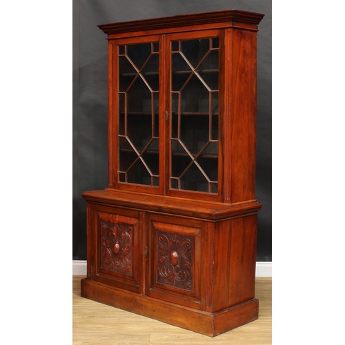 2290 - A Victorian walnut library bookcase, moulded cornice above a pair of astragal glazed doors enclosing... 