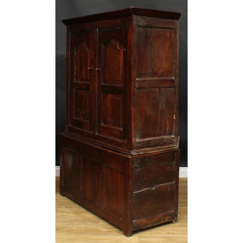 2665 - An early 18th century oak housekeeper’s livery or provision cupboard, inscribed HP and IR, moulded c... 