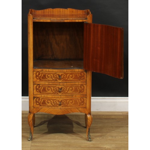 2339 - An early 20th century French kingwood and marquetry bedroom cabinet, shaped three-quarter gallery ab... 