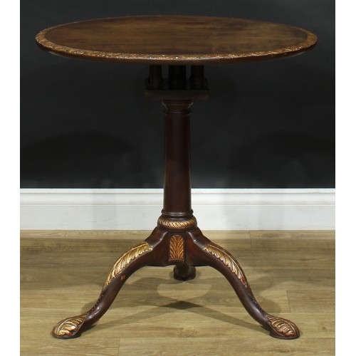 2109 - A George II style parcel-gilt mahogany tripod occasional table, circular tilting top on birdcage sup... 