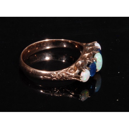 1514 - An Edwardian opal and sapphire five stone ring, claw set stones, the rose gold coloured metal shank ... 