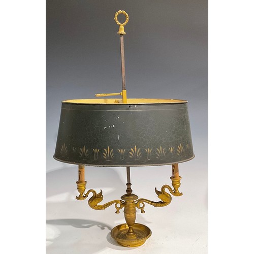 2018 - A French gilt bronze bouillote lamp, in the Empire taste, the branches cast as swans, posted handle,... 