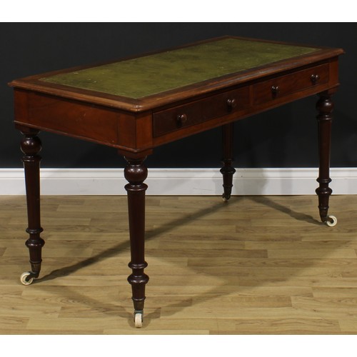 2590 - A Victorian mahogany writing table, rectangular top with inset tooled and gilt writing surface, abov... 