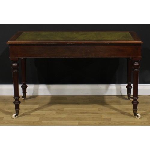 2590 - A Victorian mahogany writing table, rectangular top with inset tooled and gilt writing surface, abov... 