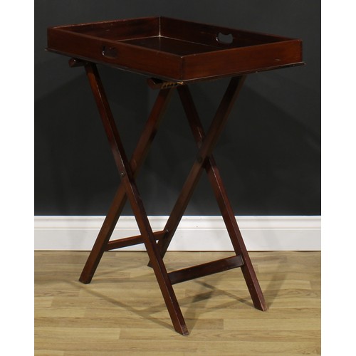 2695 - An Edwardian mahogany butler’s tray on stand, deep gallery with pierced handles, 83cm high, 71cm wid... 