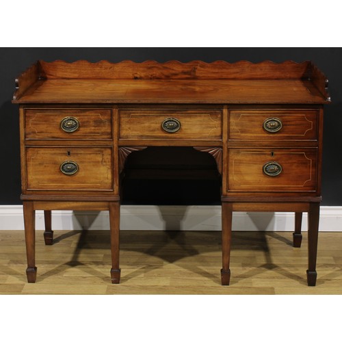 1701 - A 19th century mahogany sideboard or serving table, of unusually small proportions, wavy three-quart... 