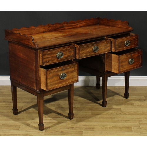 1701 - A 19th century mahogany sideboard or serving table, of unusually small proportions, wavy three-quart... 