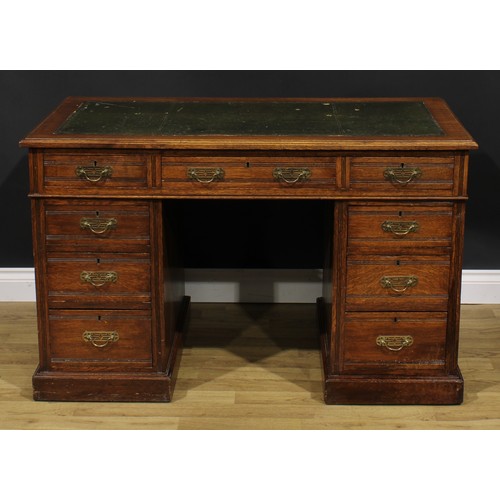 1959 - A late Victorian oak twin pedestal desk, rectangular top with inset tooled and gilt writing surface ... 