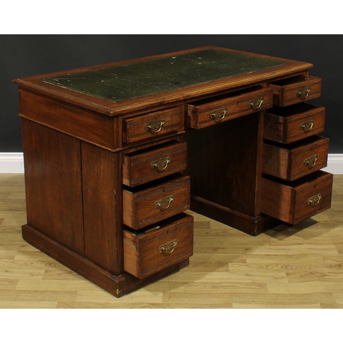 1959 - A late Victorian oak twin pedestal desk, rectangular top with inset tooled and gilt writing surface ... 