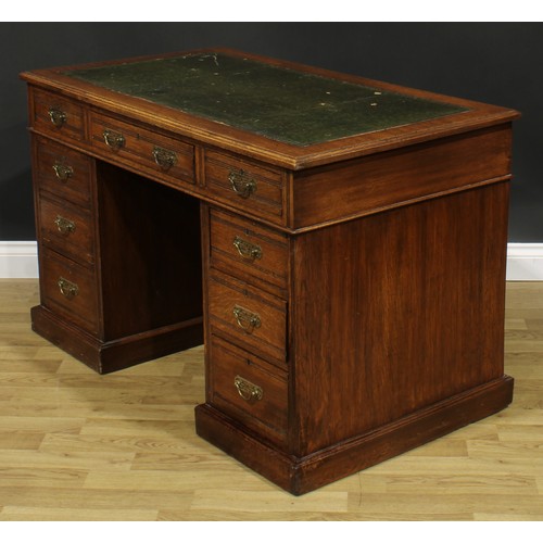 1959 - A late Victorian oak twin pedestal desk, rectangular top with inset tooled and gilt writing surface ... 