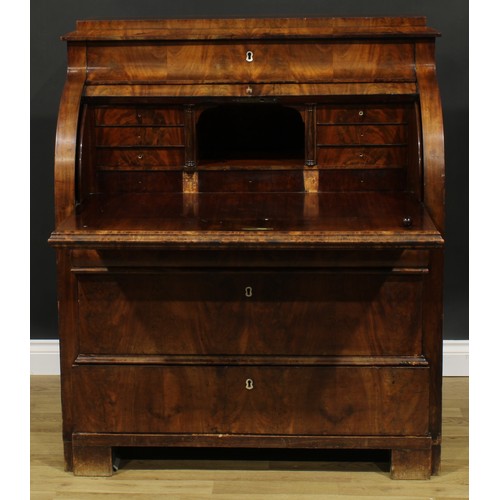 1577 - A 19th century Biedermeier flame mahogany cylinder desk, concave frieze drawer above a retractable f... 