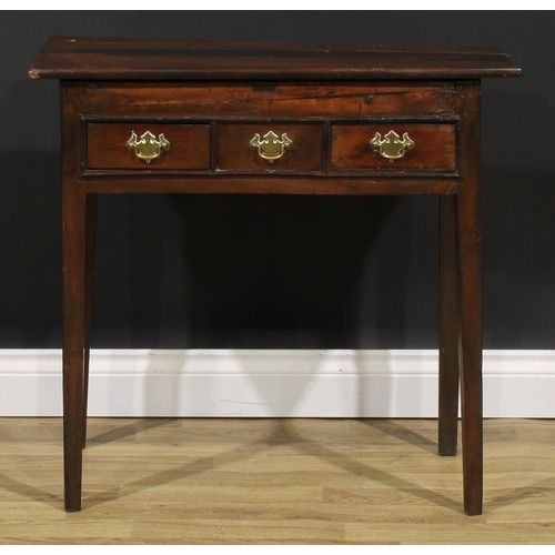 2040 - A George III vernacular fruitwood lowboy, oversailing top above two frieze drawers centred by a blin... 