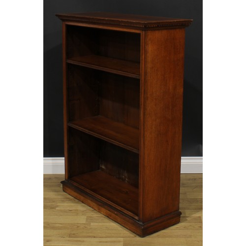 2586 - A Victorian mahogany open bookcase, by W.R Simkin, Colchester, dentil cornice above adjustable shelv... 