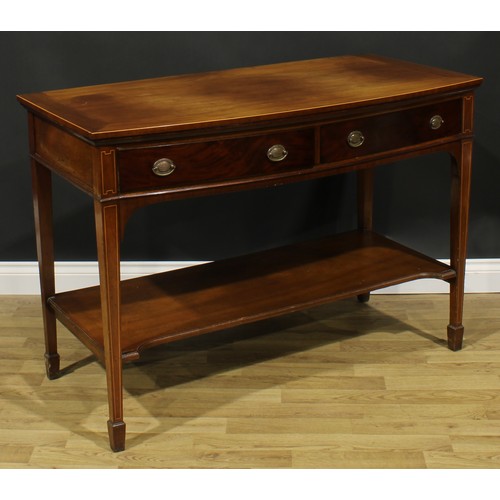 2128 - A George III Revival mahogany bowfront serving or side table, oversailing top above a pair of frieze... 