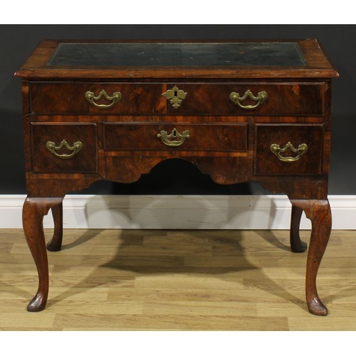 1727 - A George I walnut lowboy, crossbanded top now as a desk with inset tooled and gilt writing surface, ... 