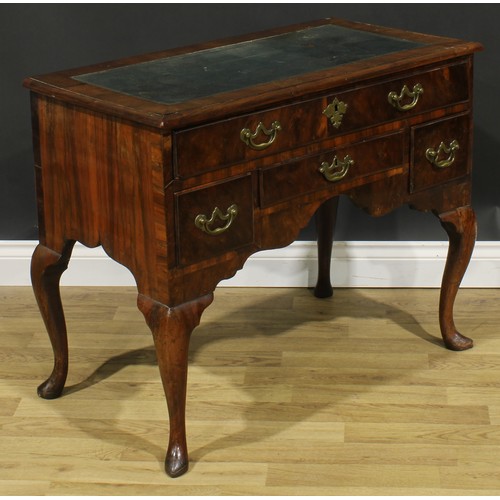 1727 - A George I walnut lowboy, crossbanded top now as a desk with inset tooled and gilt writing surface, ... 