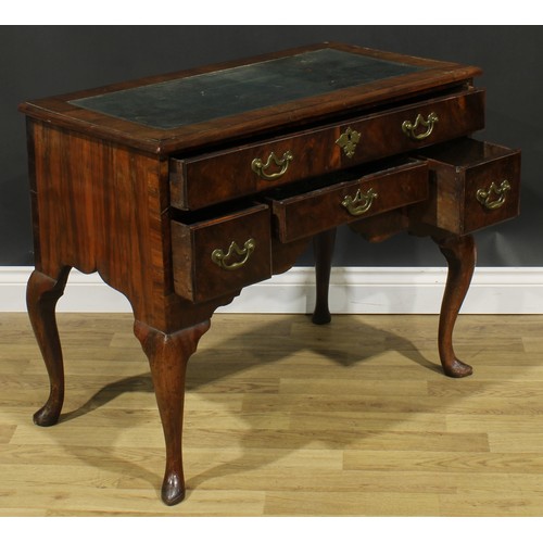 1727 - A George I walnut lowboy, crossbanded top now as a desk with inset tooled and gilt writing surface, ... 